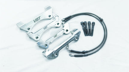Front Caliper Carrier Kit - Allows Fitment of Aston DB9 4 Piston Brembo Calipers to OE 345mm Discs (AK0010) (Audi A4 B8) - Car Enhancements UK